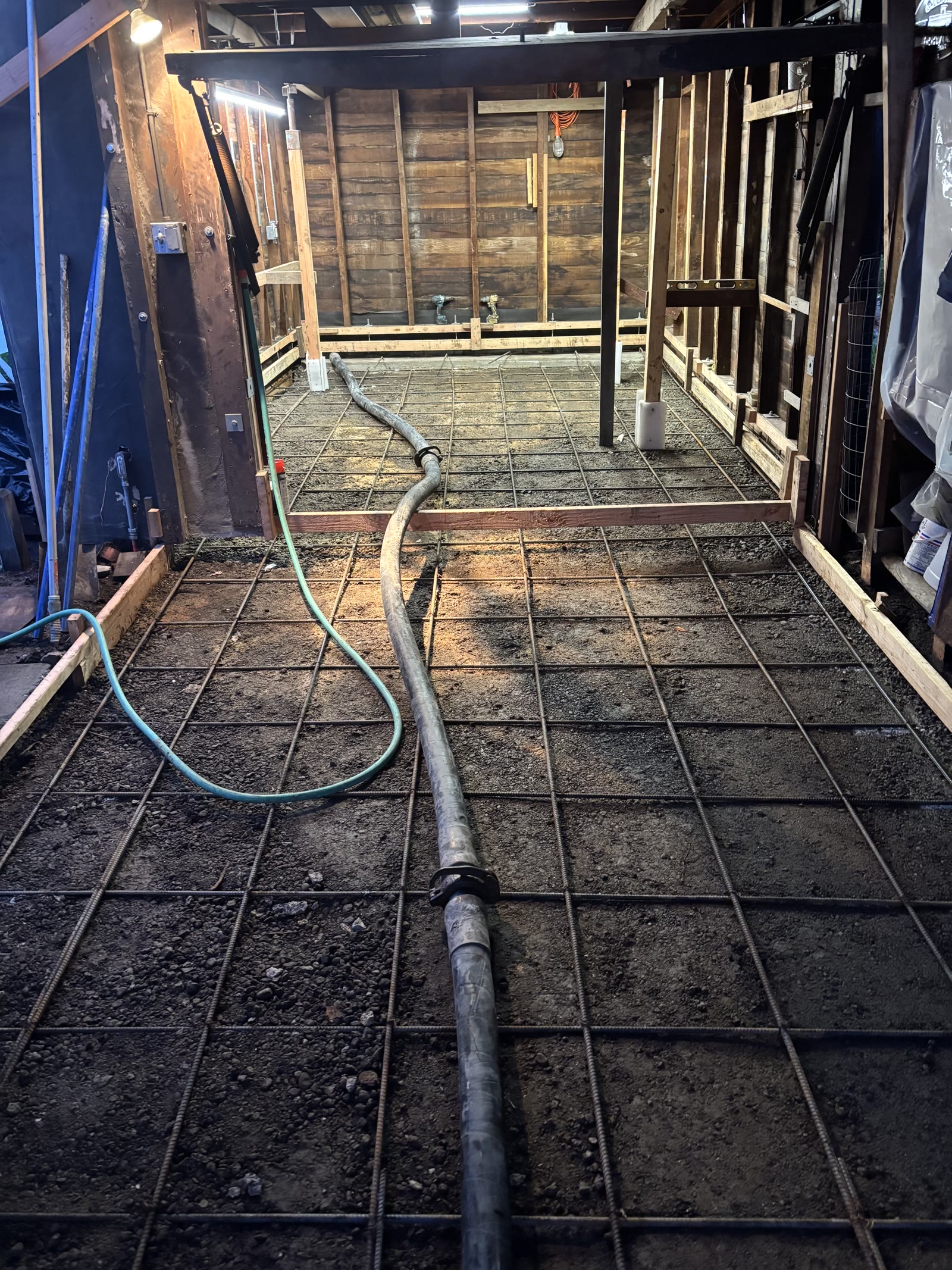 Rebar grid prepared for a new concrete garage slab