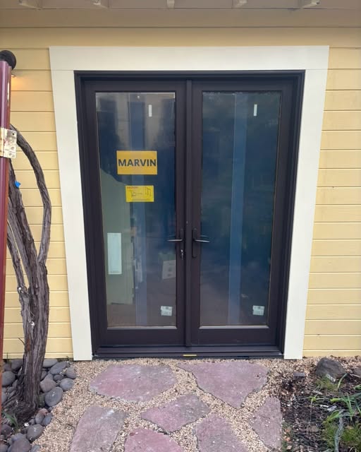 New glazed double-door entry installed at a residential project